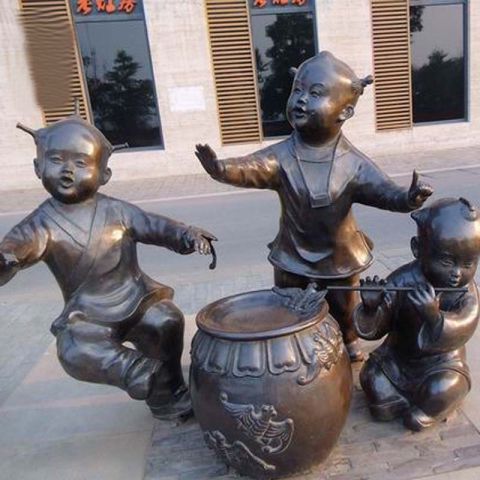 吹笛子跳舞的儿童铜雕