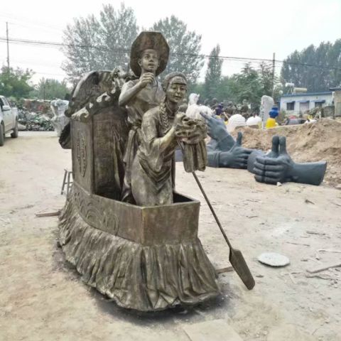 渔船上的古代夫妻铜雕